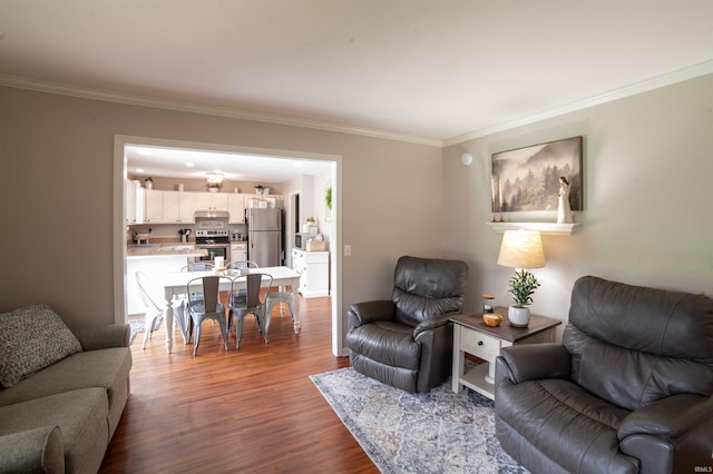 living room featuring ornamental molding and dark wood-style flooring