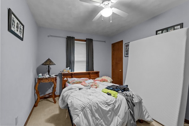 2704 President Ln, Kokomo, IN 46902 - bedroom with carpet, baseboards, and ceiling fan