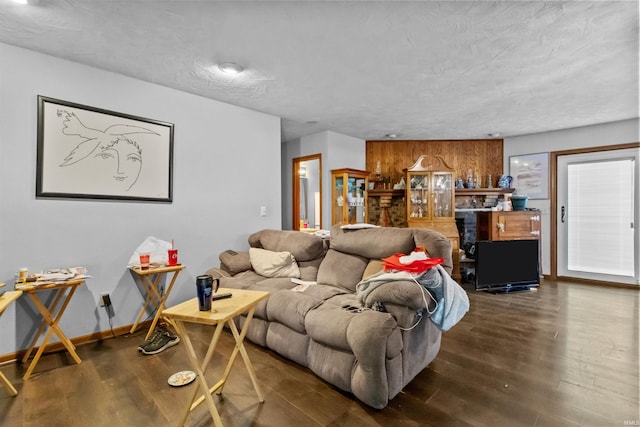 2704 President Ln, Kokomo, IN 46902 - living area featuring dark wood-style floors and wood walls