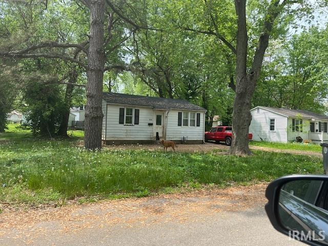 1609 Reinhardt Ave, Evansville, IN 47714 - ranch-style house with view of scattered trees