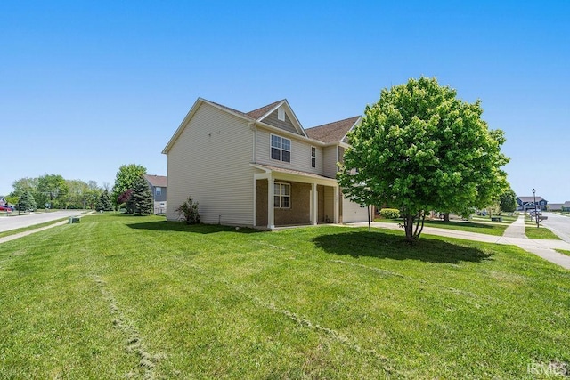 1041 Spring Mill Dr, Kokomo, IN 46902 - view of side of property with a lawn and driveway