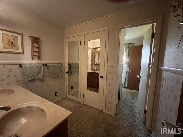 0421 S 200 W, Hartford City, IN 47348 - bathroom with double vanity and crown molding