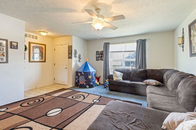 1927 Lighthouse Ln, Goshen, IN 46526 - living room featuring ceiling fan, a textured ceiling, and baseboards