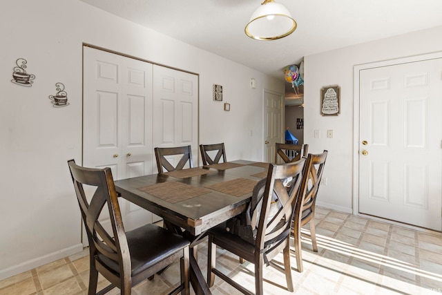 1927 Lighthouse Ln, Goshen, IN 46526 - dining room featuring baseboards