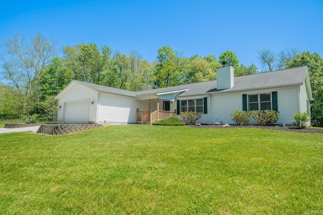 3055 S Stone Rd, Marion, IN 46953 - single story home with an attached garage, a chimney, a front lawn, and driveway