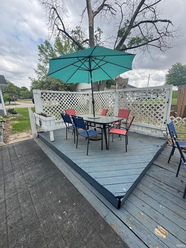 515 E Washington St, Attica, IN 47918 - wooden deck with outdoor dining space