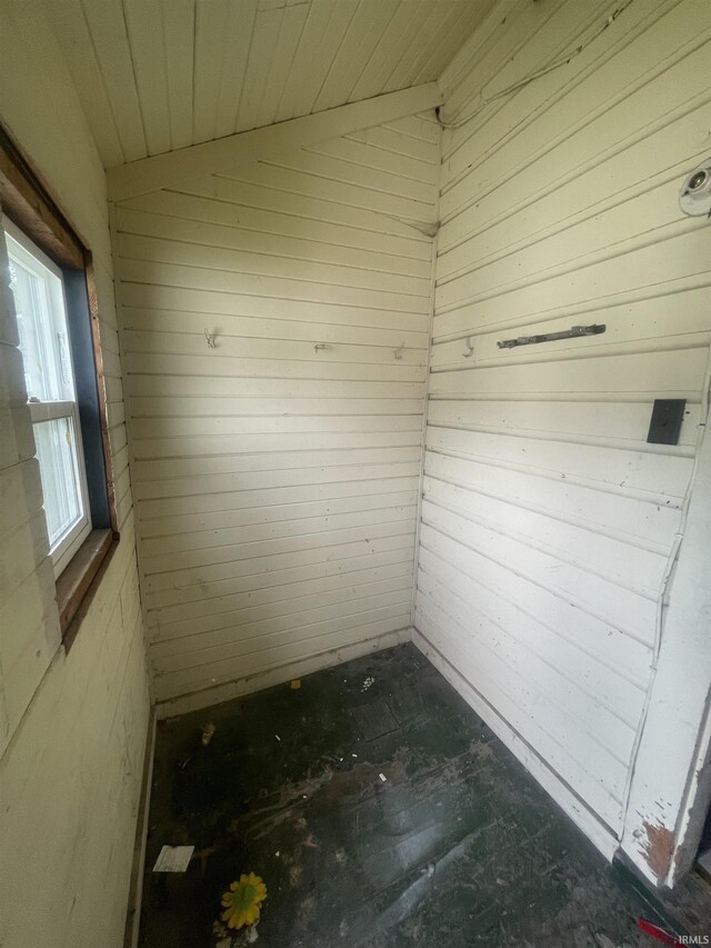1307 High St, Logansport, IN 46947 - spare room featuring wood walls