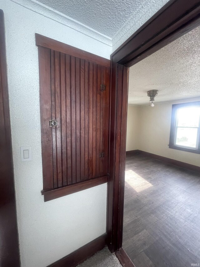 1307 High St, Logansport, IN 46947 - empty room with a textured ceiling and baseboards