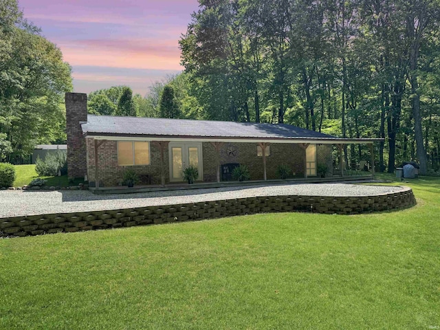 2548 N Letterman Rd, Paragon, IN 46166 - view of front of house featuring a chimney, a front lawn, brick siding, and french doors