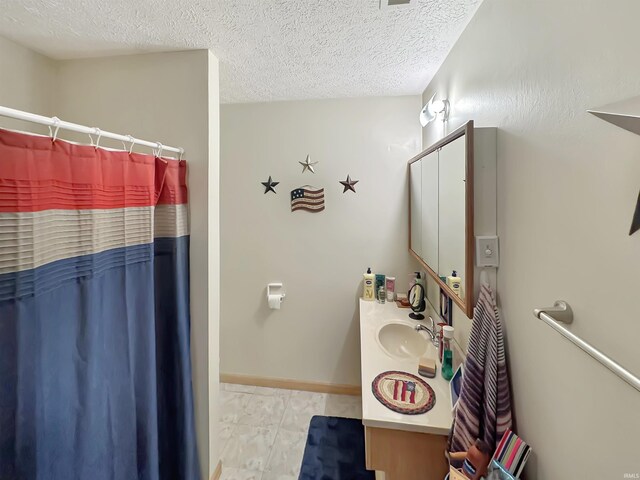2548 N Letterman Rd, Paragon, IN 46166 - full bathroom with vanity, a shower with shower curtain, and a textured ceiling