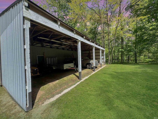 2548 N Letterman Rd, Paragon, IN 46166 - outdoor structure at dusk with a yard, a carport, an outbuilding, and an outdoor structure