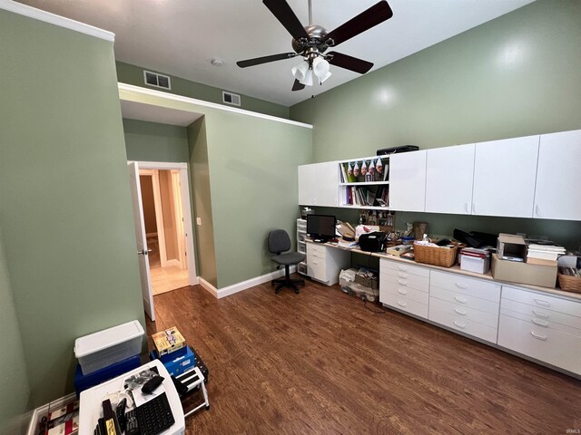 1155 N Fox Ridge Links Dr, Vincennes, IN 47591 - office featuring a ceiling fan, dark wood-type flooring, baseboards, and built in desk