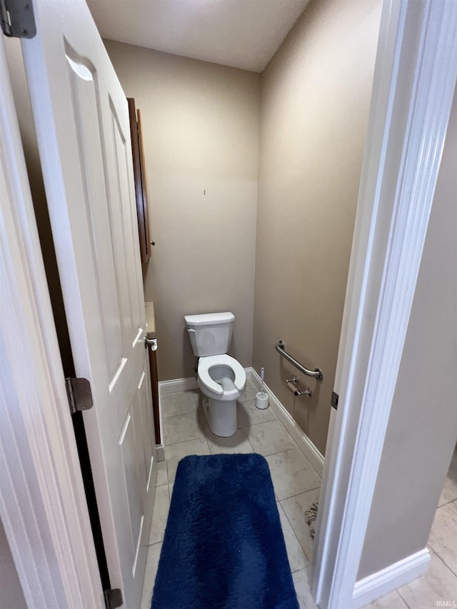 1155 N Fox Ridge Links Dr, Vincennes, IN 47591 - bathroom with toilet and baseboards