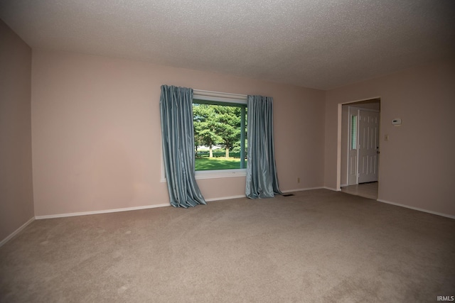 218 S 22nd St, Vincennes, IN 47591 - carpeted spare room with a textured ceiling and baseboards