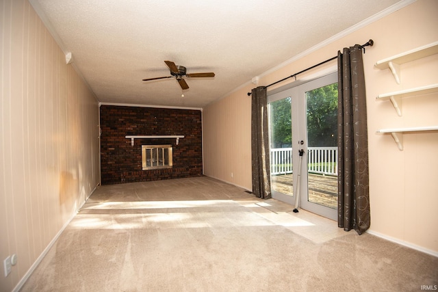 218 S 22nd St, Vincennes, IN 47591 - unfurnished living room featuring a ceiling fan, ornamental molding, a textured ceiling, carpet flooring, and baseboards