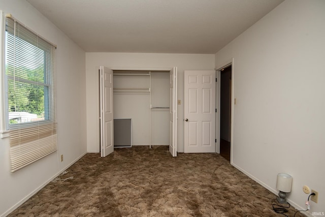 218 S 22nd St, Vincennes, IN 47591 - unfurnished bedroom with carpet flooring, a closet, and baseboards