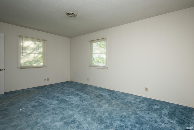 218 S 22nd St, Vincennes, IN 47591 - spare room featuring dark carpet and baseboards