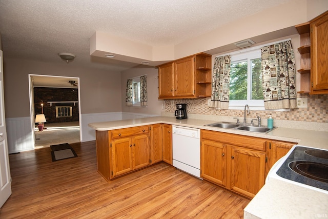 218 S 22nd St, Vincennes, IN 47591 - kitchen with open shelves, dishwasher, a sink, a peninsula, and light countertops