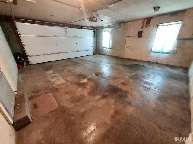 1800 N 350 W, Jasper, IN 47546 - garage with a garage door opener and concrete block wall