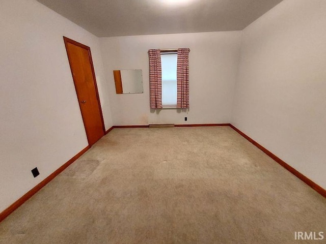 1800 N 350 W, Jasper, IN 47546 - empty room featuring light colored carpet and baseboards