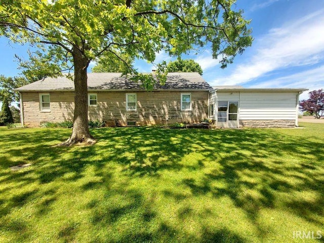 1800 N 350 W, Jasper, IN 47546 - back of property with a lawn and stone siding