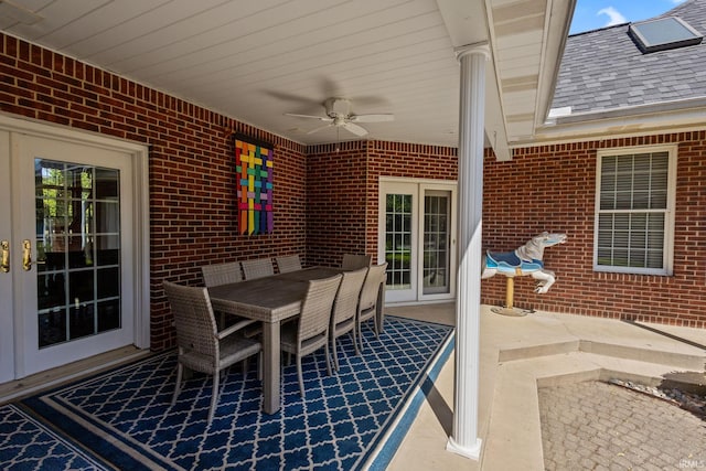 view of patio with a ceiling fan and outdoor dining space