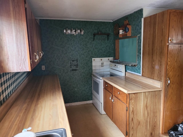 kitchen featuring white range with electric stovetop, wallpapered walls, open shelves, brown cabinets, and crown molding