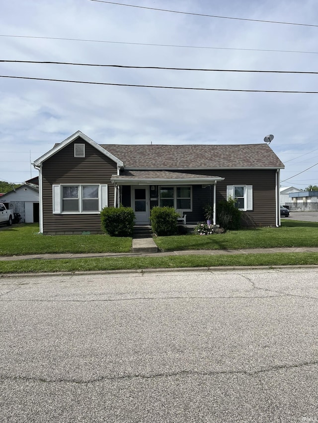502 W Vantrees St, Washington, IN 47501 - ranch-style house featuring a front lawn and a porch