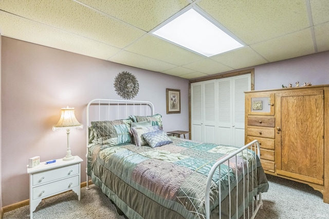 410 Longtree Ln, Logansport, IN 46947 - carpeted bedroom with a closet, a drop ceiling, and baseboards