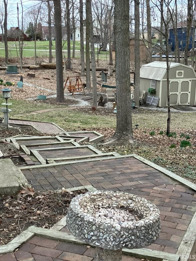 410 Longtree Ln, Logansport, IN 46947 - view of yard with a storage unit and an outbuilding
