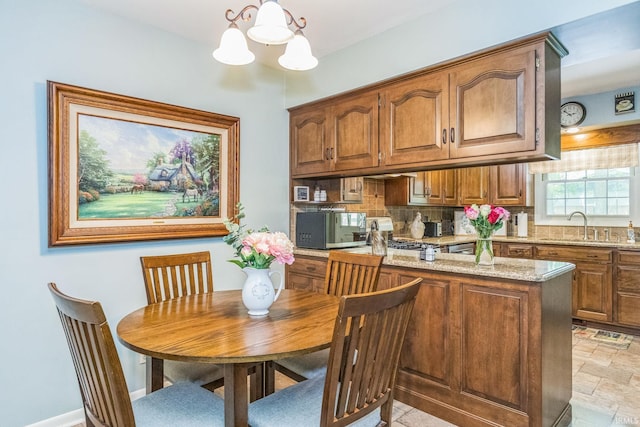 410 Longtree Ln, Logansport, IN 46947 - dining room with a chandelier