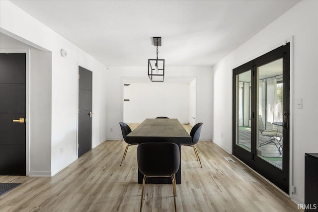 214 Mccutcheon Dr, Lafayette, IN 47909 - dining space featuring light wood-style floors and baseboards