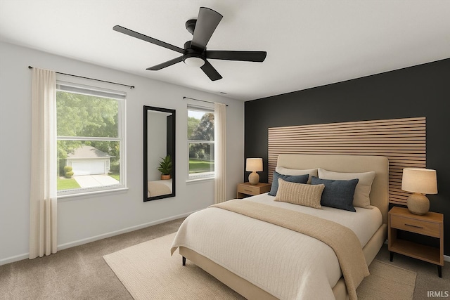 214 Mccutcheon Dr, Lafayette, IN 47909 - bedroom with carpet floors, a ceiling fan, and baseboards