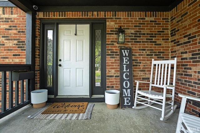 214 Mccutcheon Dr, Lafayette, IN 47909 - entrance to property with brick siding and a porch