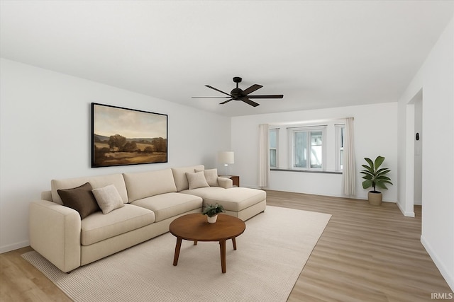 214 Mccutcheon Dr, Lafayette, IN 47909 - living room featuring light wood-style floors, a ceiling fan, and baseboards