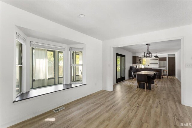 214 Mccutcheon Dr, Lafayette, IN 47909 - living room featuring light wood-type flooring and baseboards