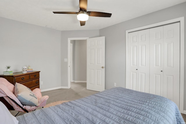 4113 S Hedgewood Ct, Bloomington, IN 47403 - bedroom with carpet floors, baseboards, a ceiling fan, and a closet