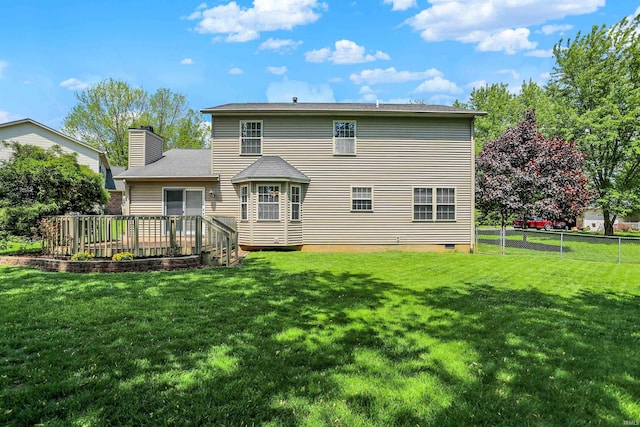 4113 S Hedgewood Ct, Bloomington, IN 47403 - back of property with a deck, a chimney, and crawl space