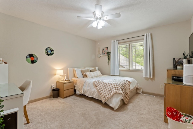23306 Bluff Crest Dr, Elkhart, IN 46516 - bedroom featuring light colored carpet, baseboards, and ceiling fan
