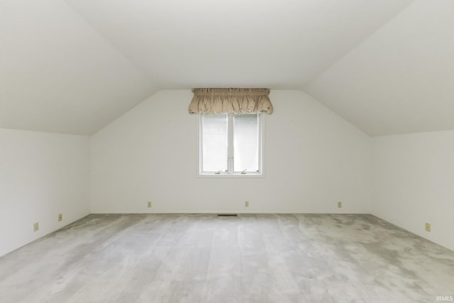 3400 W Riggin Rd Unit 6, Muncie, IN 47304 - bonus room featuring lofted ceiling and light colored carpet