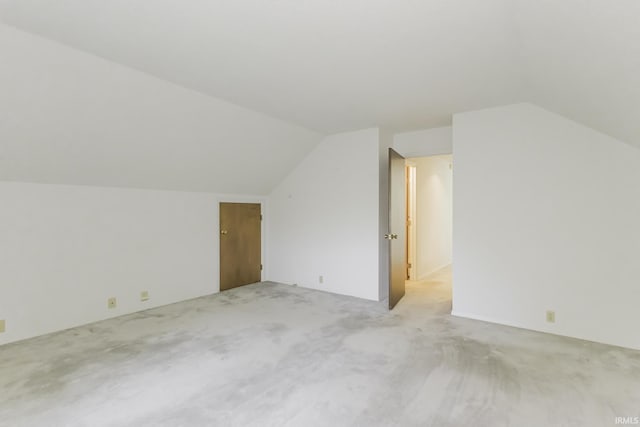3400 W Riggin Rd Unit 6, Muncie, IN 47304 - bonus room featuring lofted ceiling and light carpet