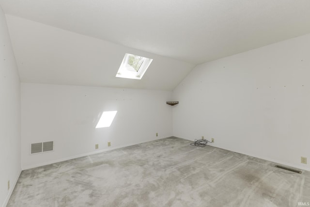 3400 W Riggin Rd Unit 6, Muncie, IN 47304 - bonus room with a skylight, lofted ceiling, light colored carpet, and plenty of natural light