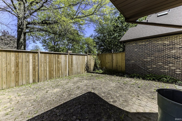 3400 W Riggin Rd Unit 6, Muncie, IN 47304 - fenced backyard with a patio area