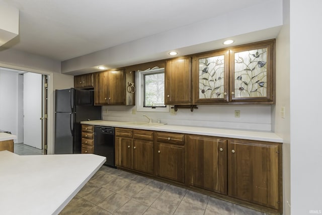 3400 W Riggin Rd Unit 6, Muncie, IN 47304 - kitchen with black appliances, a sink, light countertops, and recessed lighting