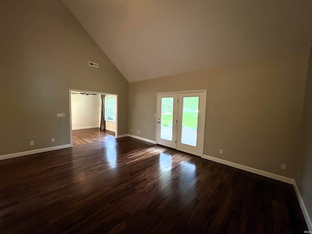 1643 W 1st St, Jasper, IN 47546 - unfurnished room featuring high vaulted ceiling, baseboards, and dark wood-style floors