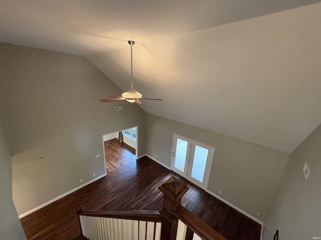 1643 W 1st St, Jasper, IN 47546 - staircase with vaulted ceiling, wood finished floors, ceiling fan, and baseboards