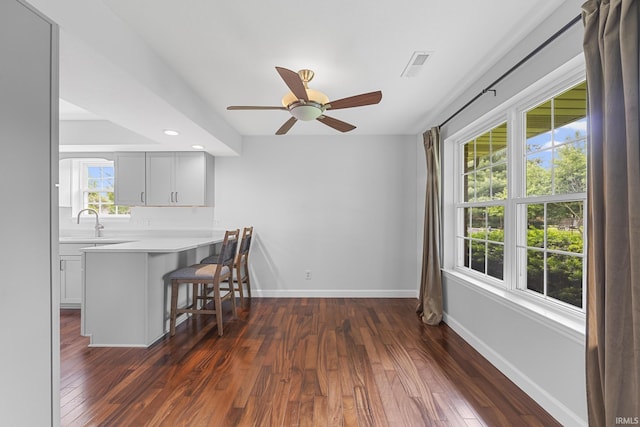 1643 W 1st St, Jasper, IN 47546 - dining area featuring dark wood-style floors, baseboards, ceiling fan, and recessed lighting