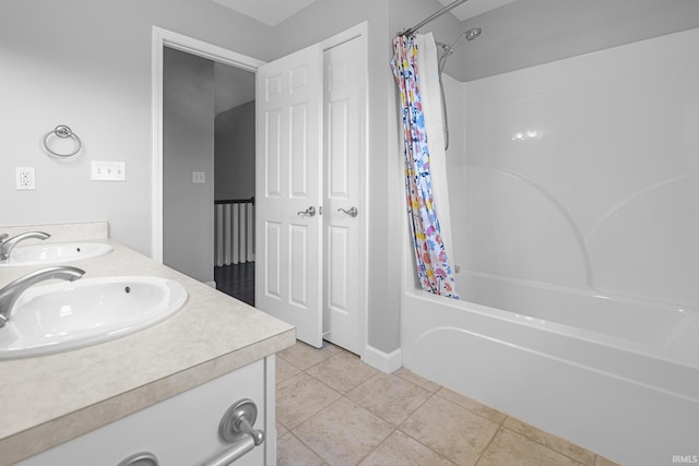 1643 W 1st St, Jasper, IN 47546 - full bathroom with shower / tub combo with curtain, tile patterned flooring, and double vanity