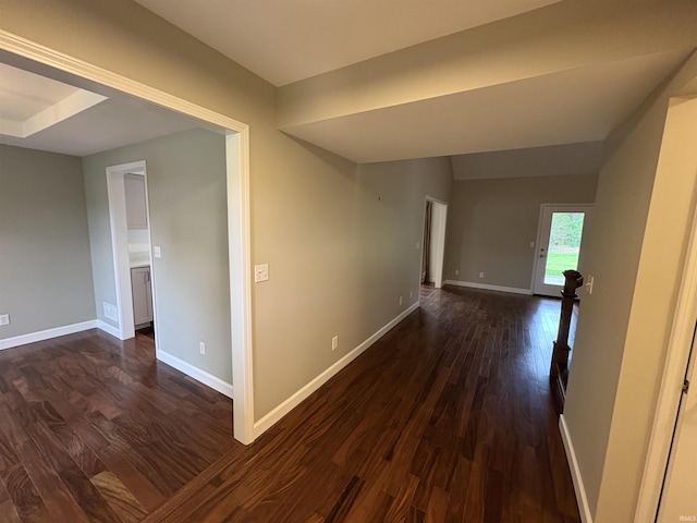1643 W 1st St, Jasper, IN 47546 - corridor with dark wood finished floors and baseboards