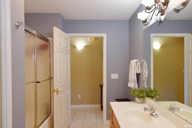 8122 Covington Ct, Newburgh, IN 47630 - full bath featuring a shower with door, vanity, a chandelier, tile patterned floors, and baseboards